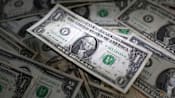 Dollar heads for weekly rise, yen slumps ahead of Japan's election